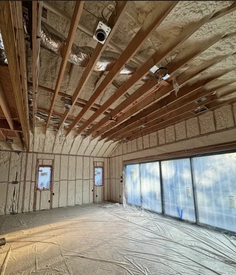 Interior walls and ceiling insulated with spray foam during new construction in Anderson