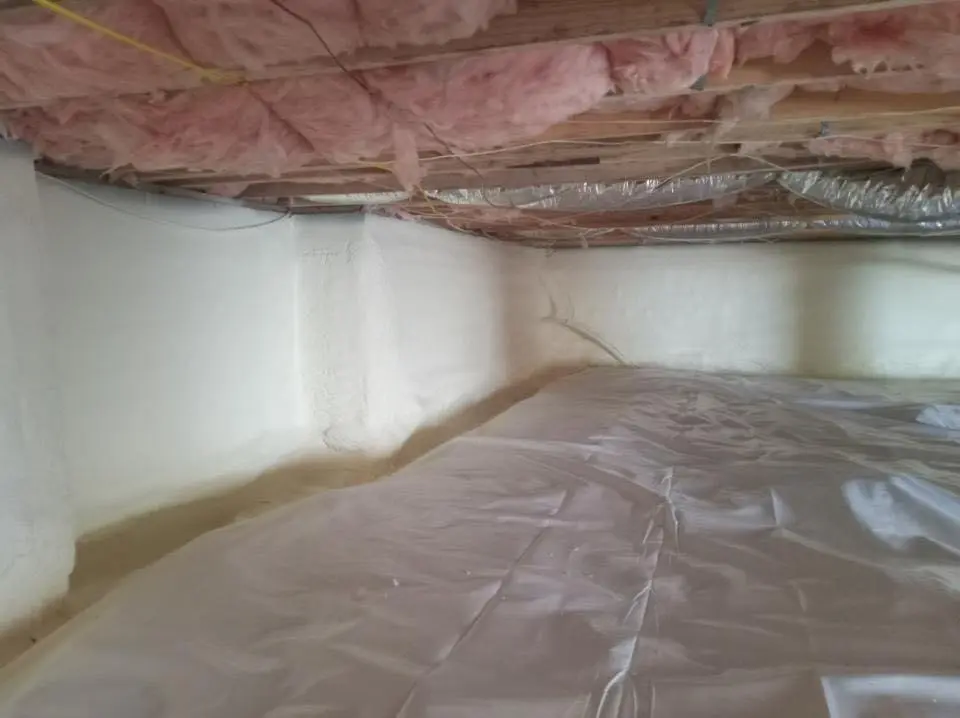 Crawl space encapsulation with closed-cell spray foam for Commercial Roof Restoration in Anderson